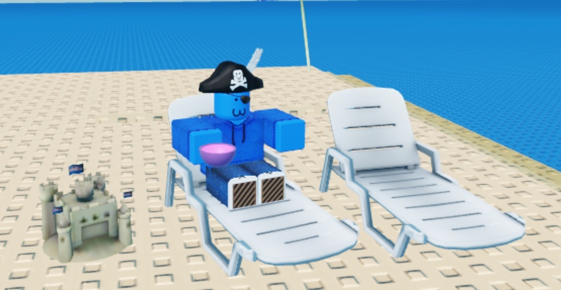 nuke at the beach with a cup of purple tea